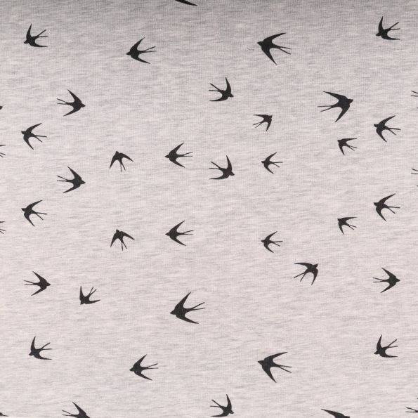 Tissu Sweat Oiseaux Noirs sur fond Gris chiné - Par 10 cm