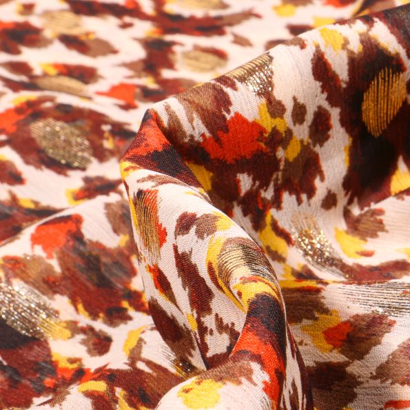 Tissu Mousseline lurex Adrienne orange sur fond Beige - Par 10 cm