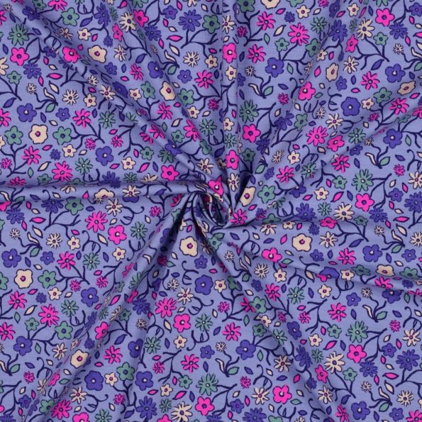 Tissu Jersey Coton imprimé Petites fleurs multicolores sur fond Lilas - Par 10 cm