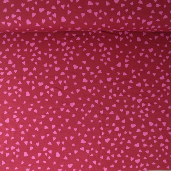 Tissu Sweat léger French Terry Capucine cœurs Roses sur fond Framboise - Par 10 cm