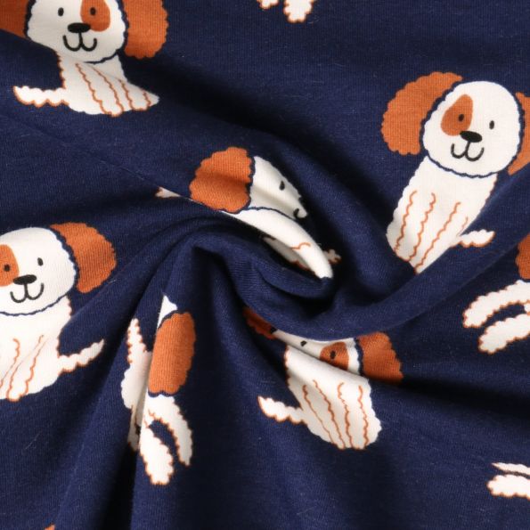 Tissu Sweat léger envers molletonné Oscar chiots Blancs sur fond Bleu marine - Par 10 cm