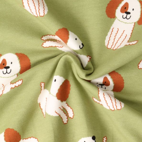 Tissu Sweat léger envers molletonné Oscar chiots Blancs sur fond Vert amande - Par 10 cm