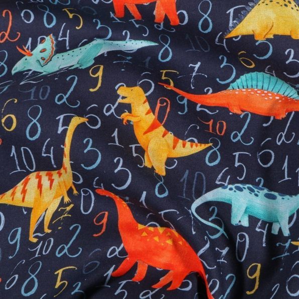 Tissu Coton imprimé Dinosaures et chiffres sur fond Bleu marine - Par 10 cm