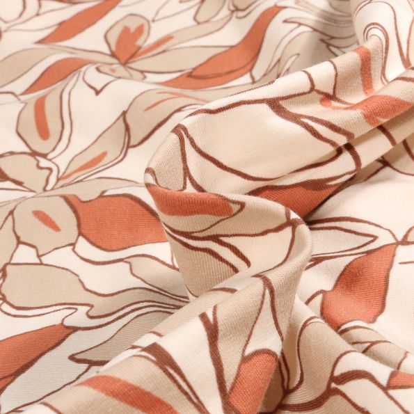 Tissu Jersey Coton Anissa sur fond Beige - Par 10 cm