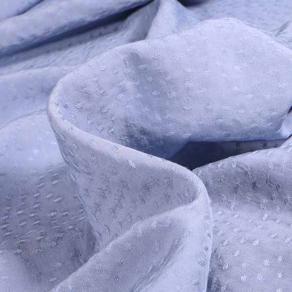 Tissu Viscose Rajah sur fond Bleu lavande - Par 10 cm