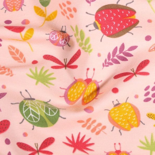 Tissu Jersey Coton Insectes et fleurs sur fond Rose - Par 10 cm