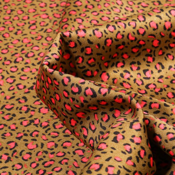 Tissu Satin imprimé Tache léopard sur fond Bronze - Par 10 cm