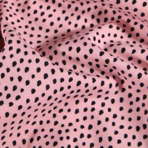 Tissu Jersey Coton Gouttes noires sur fond Rose - Par 10 cm