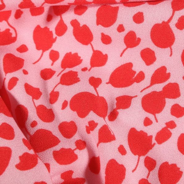 Tissu Crêpe stretch Tulipes rouges sur fond Rose - Par 10 cm