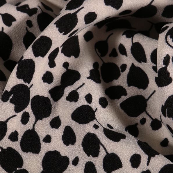 Tissu Crêpe stretch Tulipes noires sur fond Blanc cassé - Par 10 cm