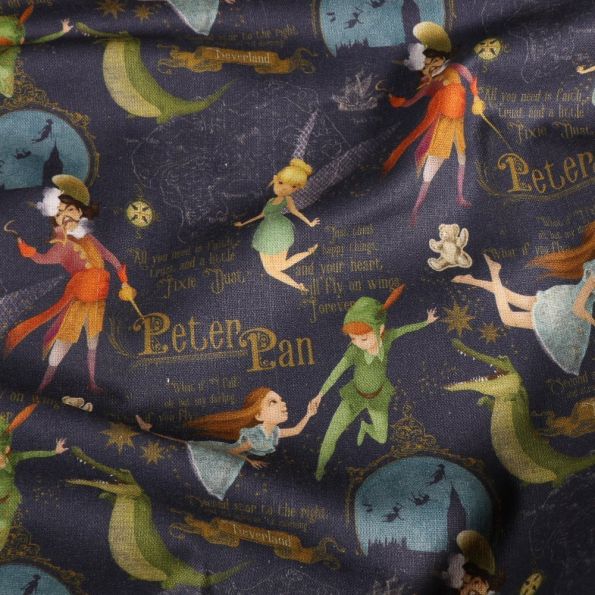 Tissu Coton imprimé Peter Pan sur fond Bleu marine - Par 10 cm