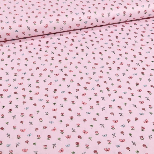 Tissu Coton imprimé Petits bouquets de fleurs et papillons sur fond Rose - Par 10 cm