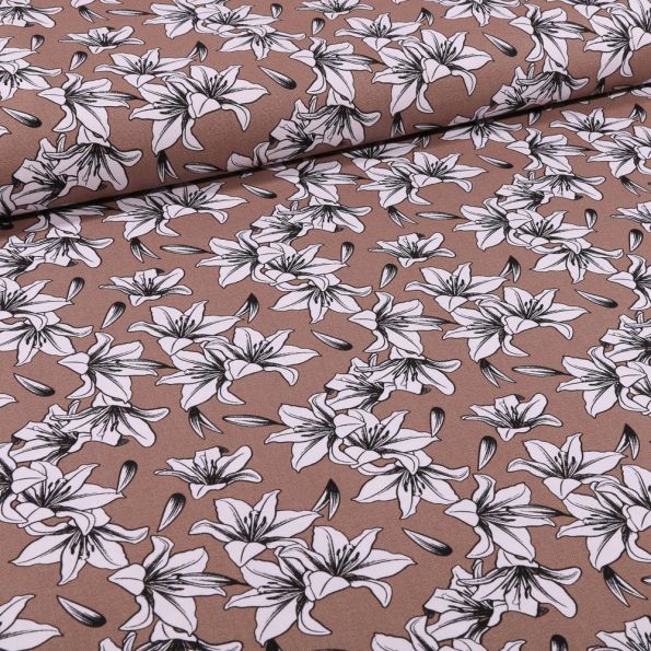 Tissu Toile Coton Lys blancs et noirs sur fond Marron - Par 10 cm