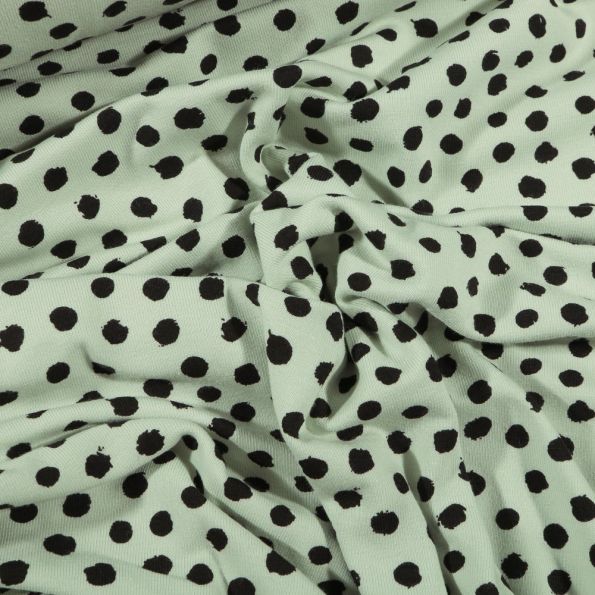 Tissu Jersey Coton Bio Pois déstructurés noirs sur fond Vert menthe - Par 10 cm