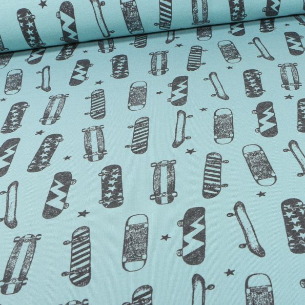 Tissu Jersey Coton Skateboard sur fond Bleu - Par 10 cm