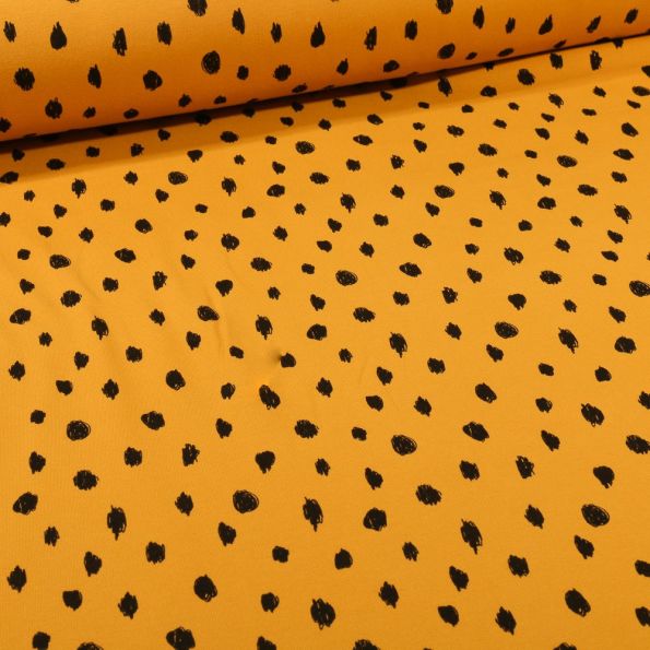 Tissu Sweat léger envers molletonné Bio Pois noirs sur fond Jaune curcuma - Par 10 cm