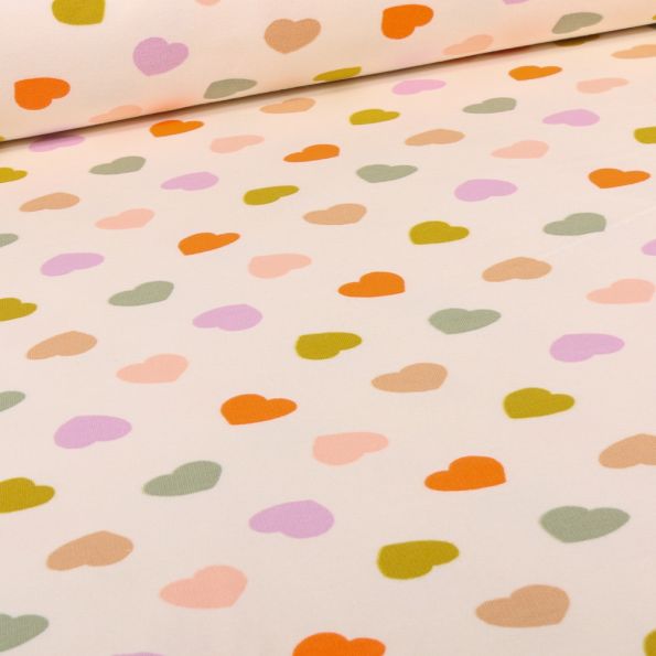 Tissu Sweat envers molletonné Coeus multicolores sur fond Beige - Par 10 cm