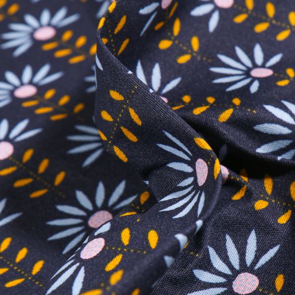 Tissu Coton enduit Pâquerettes sur fond Bleu marine - Par 10 cm