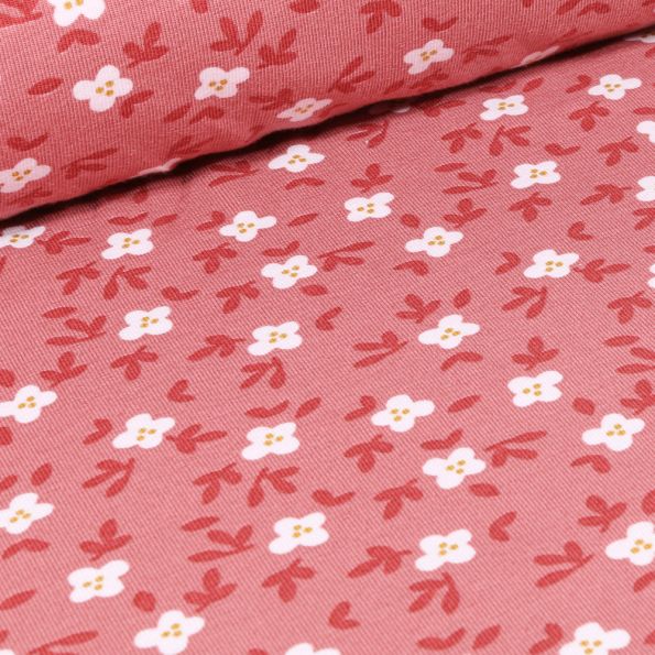 Tissu Jersey Coton Bio Fleurs blanches et feuilles sur fond Rose - Par 10 cm
