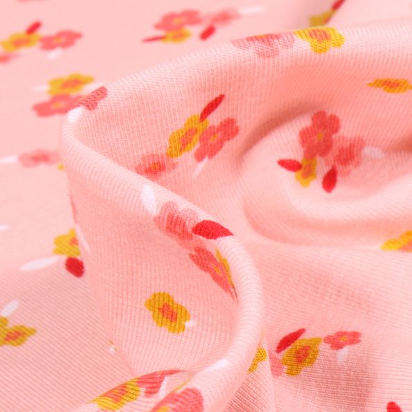 Tissu Jersey Coton Lili sur fond Rose - Par 10 cm