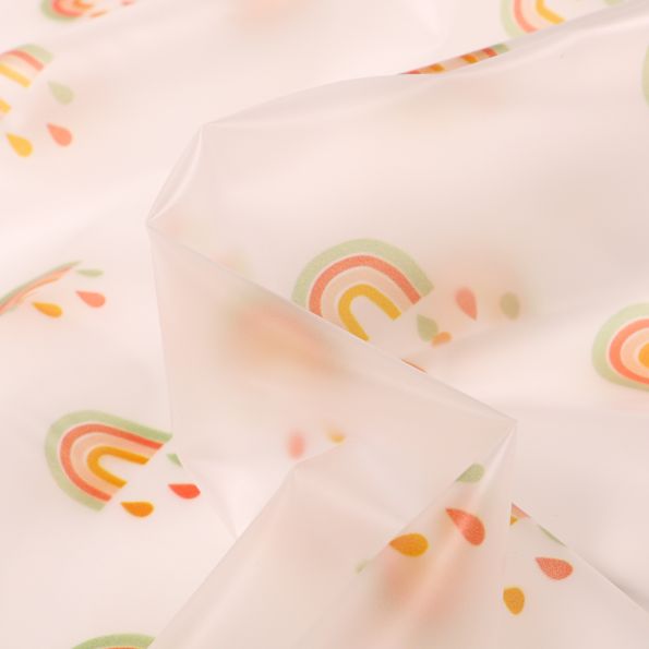 Tissu imperméable Arc en ciel sur fond Transparent - Par 10 cm