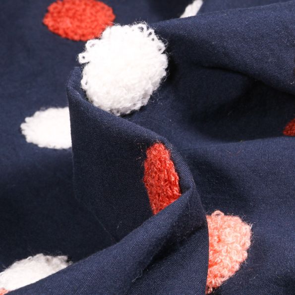 Tissu Coton lavé Pois en relief blanc et rouge sur fond Bleu marine - Par 10 cm
