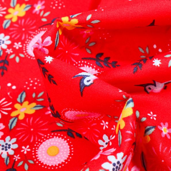 Tissu Coton imprimé Fleurs estivales sur fond Rouge - Par 10 cm
