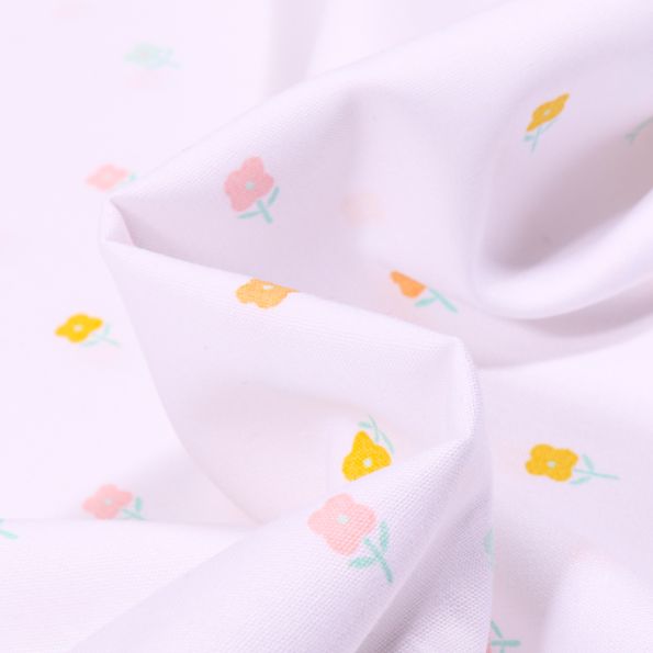 Tissu Coton imprimé LittleBird Arc en ciel pastel sur fond Blanc - Par 10 cm