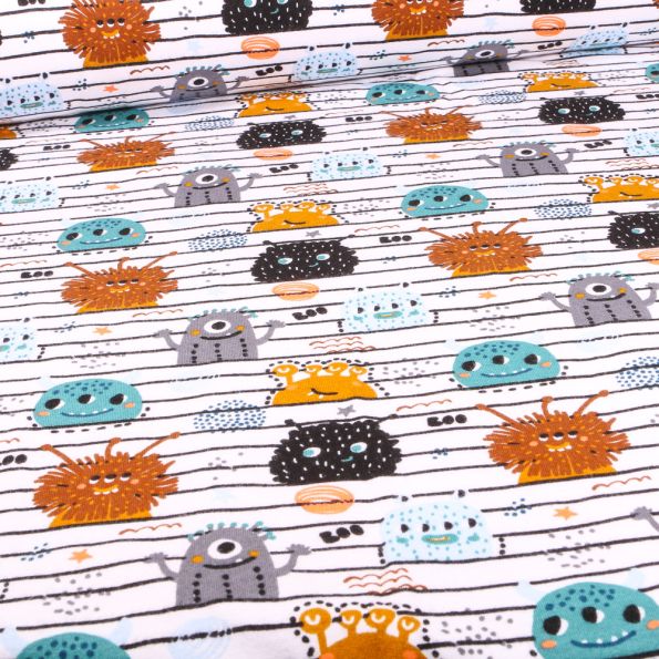 Tissu Jersey Coton Bio Monstres rigolos sur fond Blanc - Par 10 cm