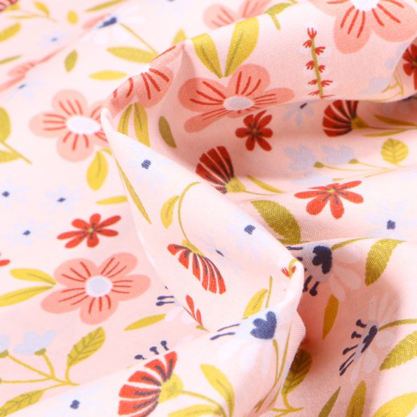 Tissu Coton imprimé Fleurs des champs sur fond Rose pâle - Par 10 cm