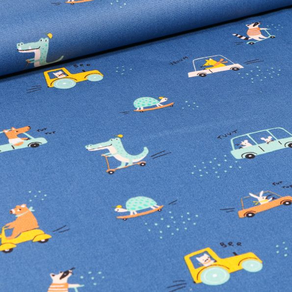 Tissu Coton imprimé Animaux skate et trottinette sur fond Bleu - Par 10 cm