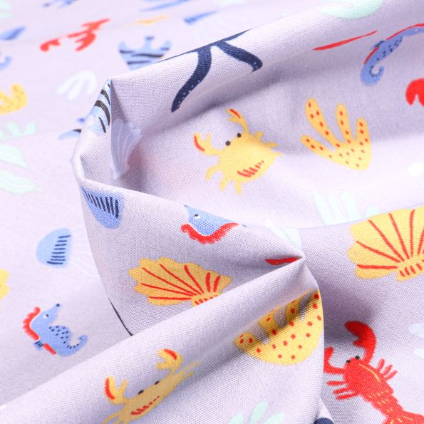 Tissu Coton imprimé Pieuvres et coquillages sur fond Gris clair - Par 10 cm