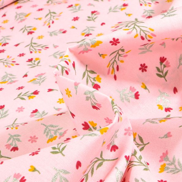 Tissu Coton imprimé Fily sur fond Rose pâle - Par 10 cm