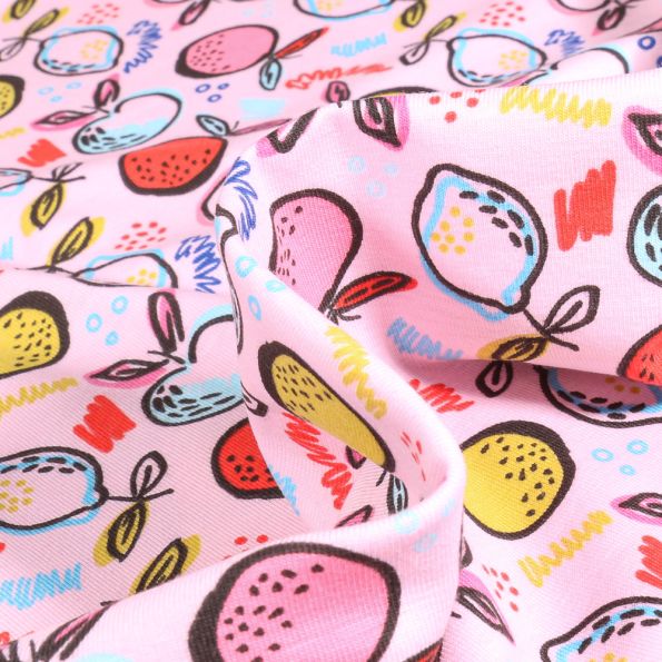 Tissu Jersey Coton Bio Fruits multicolores sur fond Rose - Par 10 cm