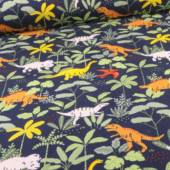 Tissu Jersey coton envers gratté Bio Tyrannosaure sur fond Bleu marine - Par 10 cm