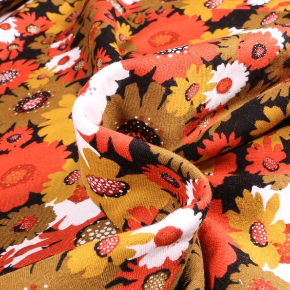 Tissu Jersey Coton envers molletonné Bio Tournesol sur fond Noir - Par 10 cm