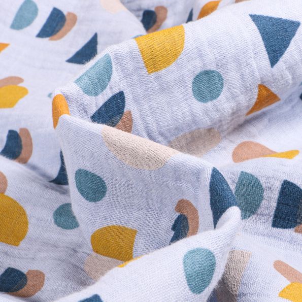 Tissu Double gaze Bio Formes géométriques sur fond Bleu ciel - Par 10 cm