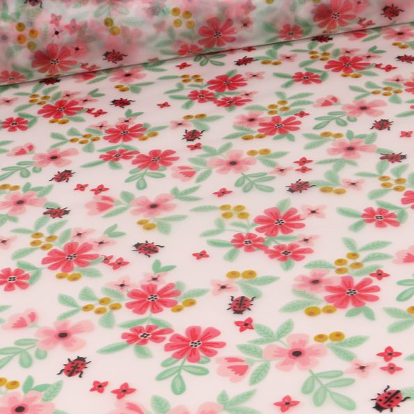 Tissu imperméable Coccinelle et fleurs rose sur fond Transparent - Par 10 cm