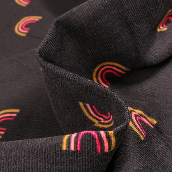 Tissu Velours milleraies Arc en ciel sur fond Noir - Par 10 cm