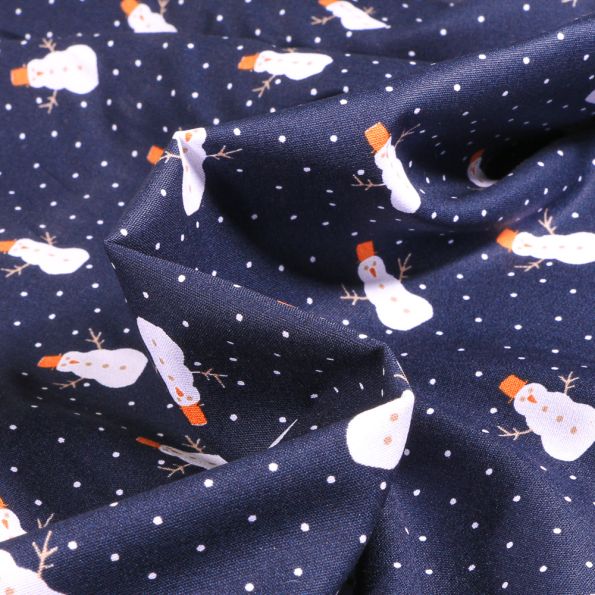Tissu Coton imprimé Bonhomme de neige sur fond Bleu marine - Par 10 cm