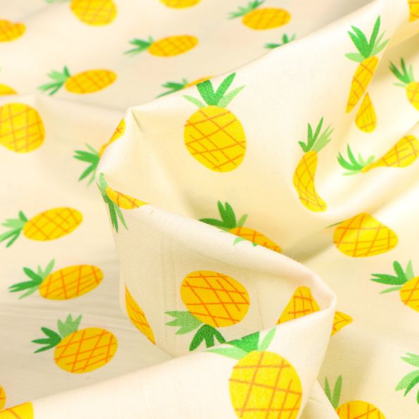 Tissu Coton popeline imprimé Ananas sur fond Jaune pastel - Par 10 cm