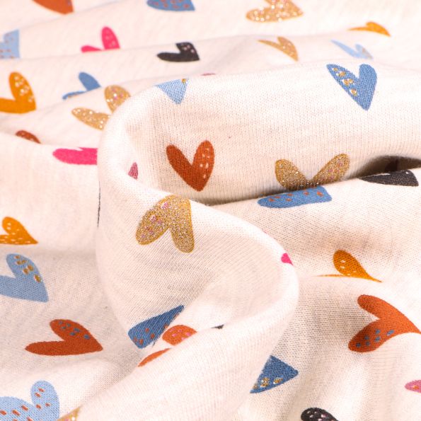 Tissu Jersey Coton envers Molleton Heart sur fond Beige chiné - Par 10 cm