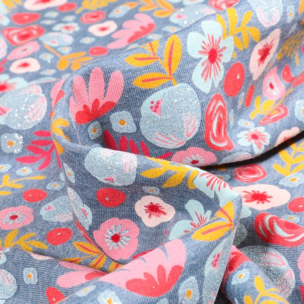 Tissu Jersey de coton Edelweiss sur fond Bleu chiné - Par 10 cm