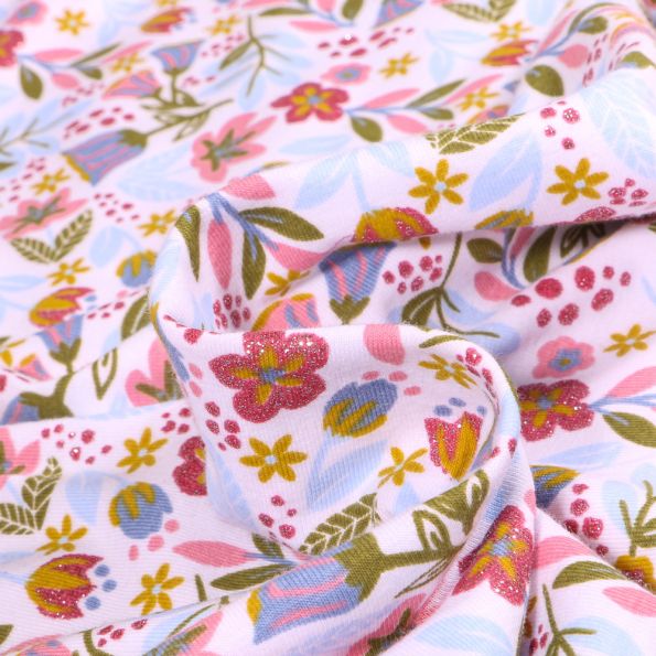 Tissu Jersey Coton pailleté Amaryllis sur fond Blanc - Par 10 cm