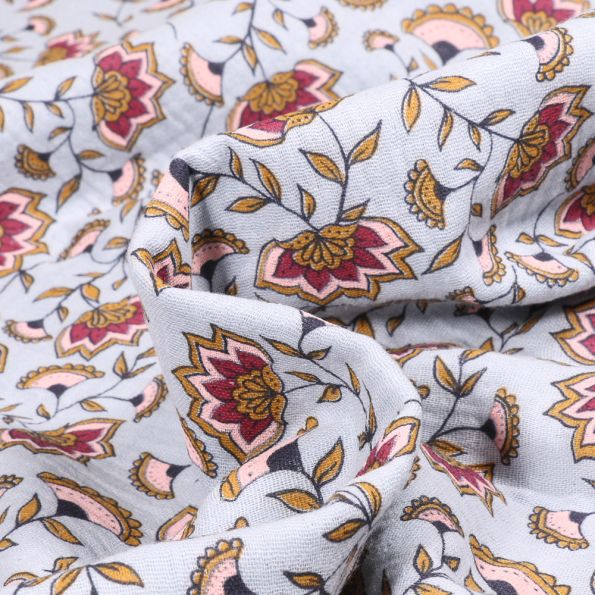 Tissu Double gaze Fleurs mandala sur fond Bleu ciel - Par 10 cm