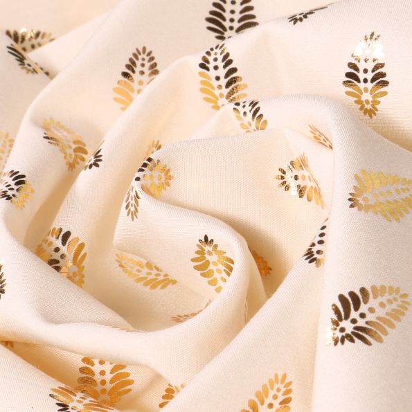 Tissu Viscose Feuilles métallisées dorées sur fond Ecru - Par 10 cm