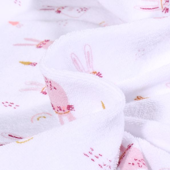 Tissu Jersey Velours Eponge Lapinou sur fond Blanc - Par 10 cm