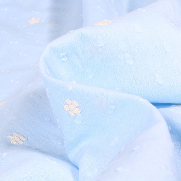 Tissu Plumetis Coton Petites fleurs brodées sur fond Bleu ciel - Par 10 cm