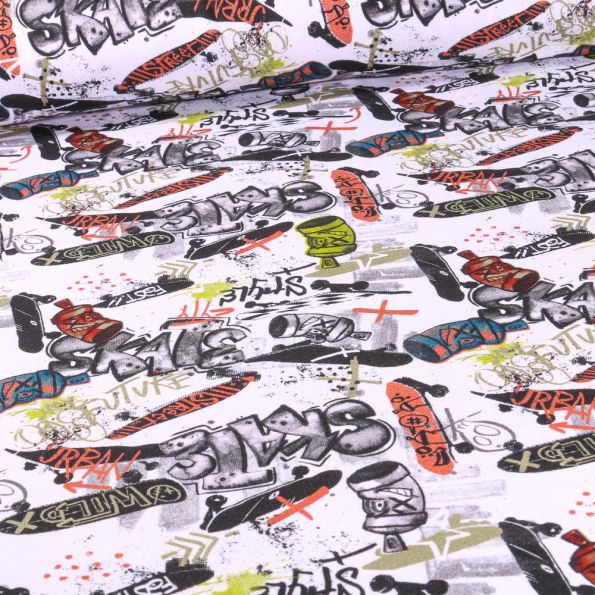 Tissu Jersey Coton envers gratté Street art sur fond Blanc - Par 10 cm