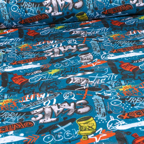 Tissu Jersey Coton envers gratté Street art sur fond Bleu turquoise - Par 10 cm